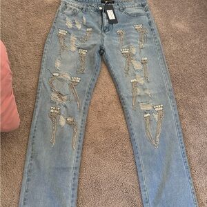 Distressed Blue Jeans with rhinestones